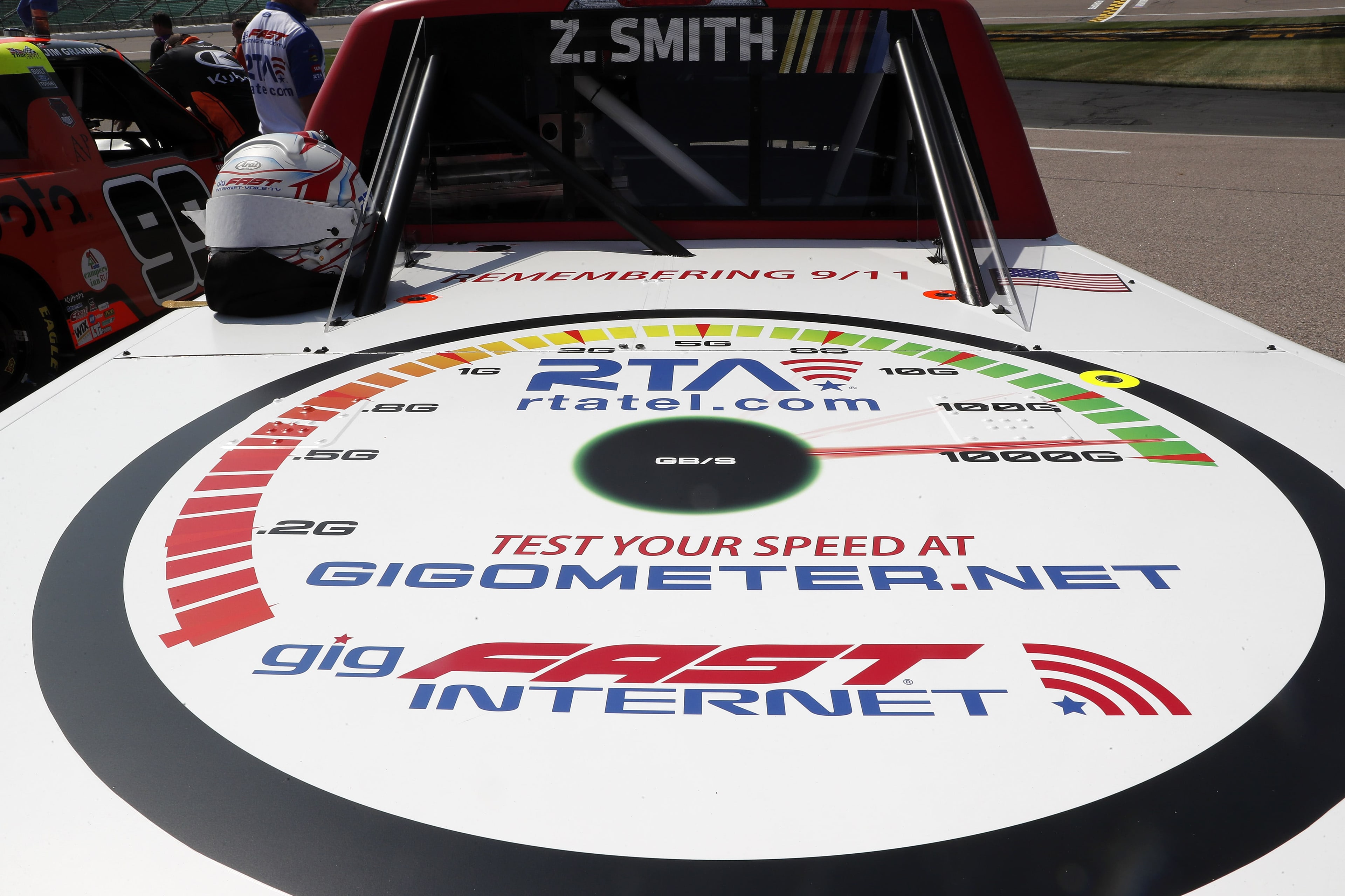 Gigometer internet speed dial graphic on the #38 truck bed, photographed from above — shows Z. Smith name bar and speed ranges from 2G to 1000G